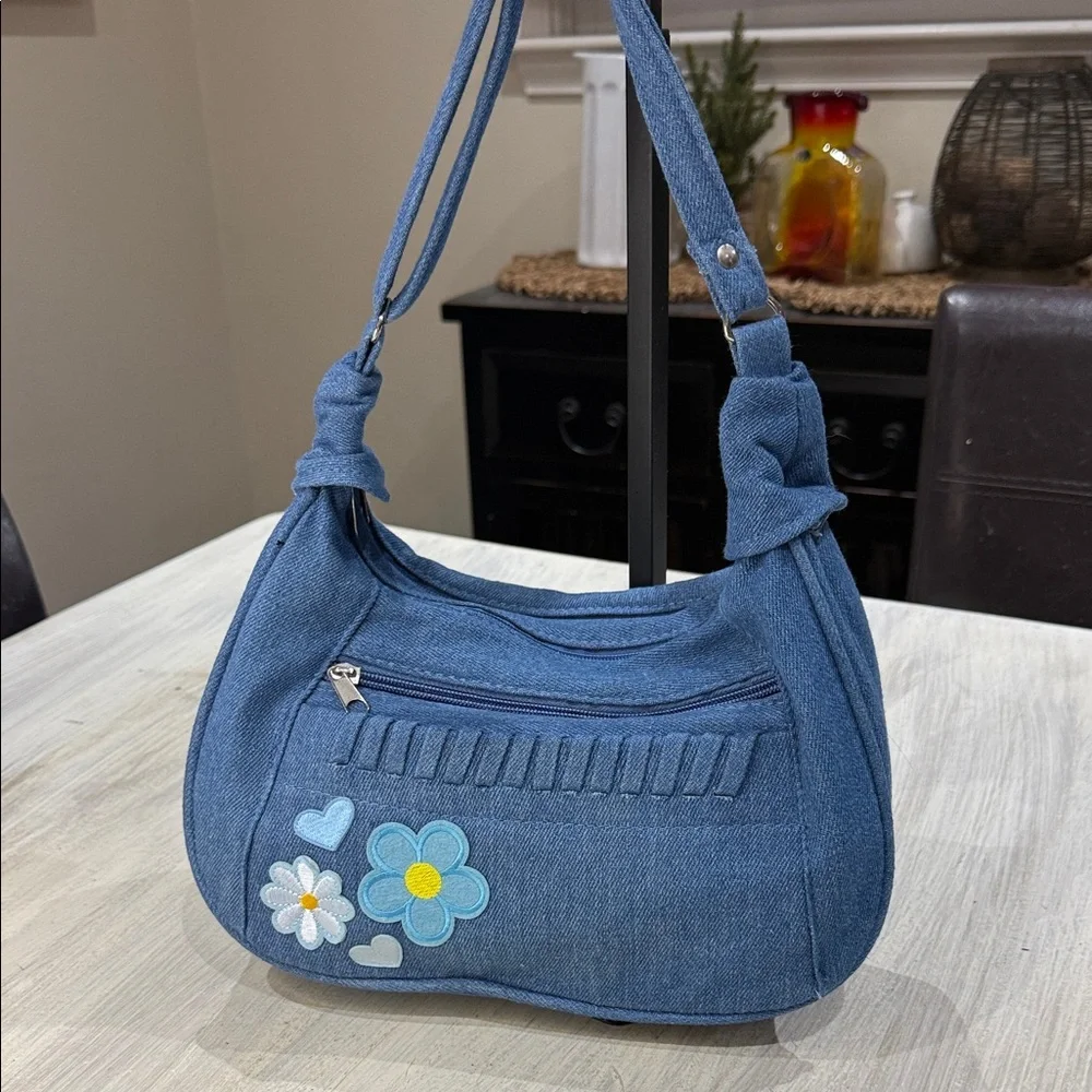 Chic Blue Denim Hobo Bag with Floral Accents